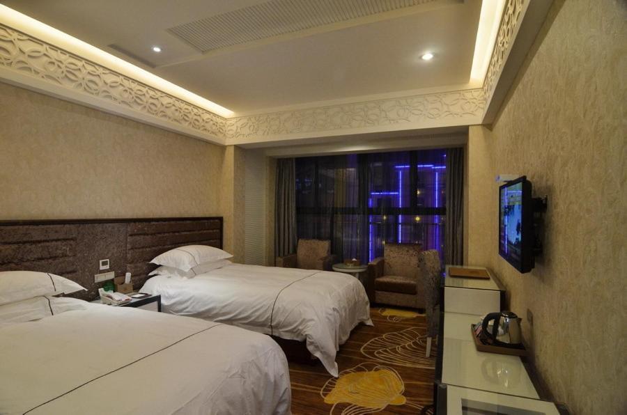 Yiwu Chu Xin Hotel Стая снимка