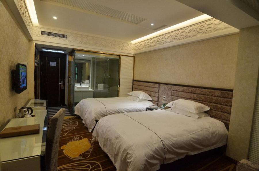Yiwu Chu Xin Hotel Стая снимка